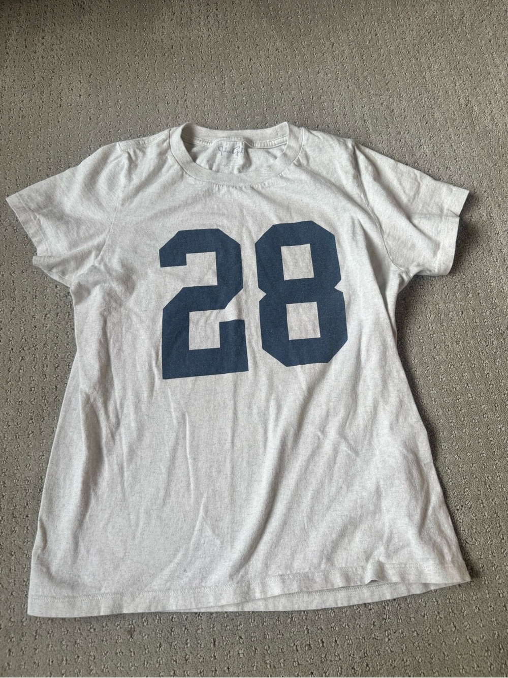 Brandy Melville number 28 grey tee.